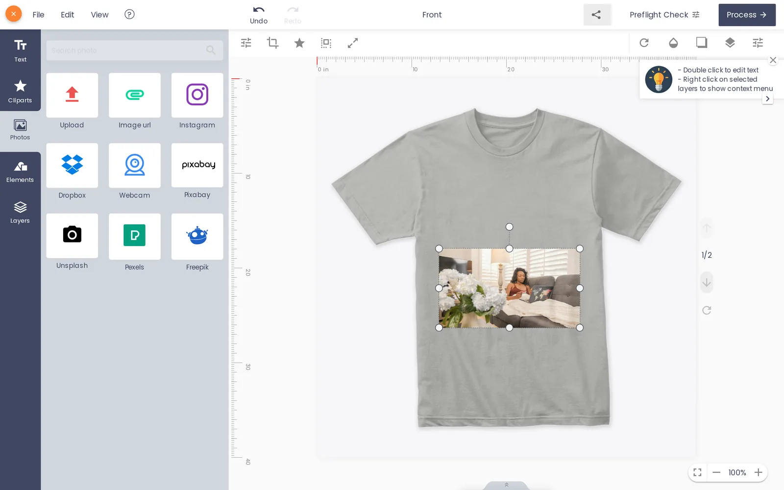 Customer uploading their own photo onto a t-shirt design inside the Cmsmart online designer