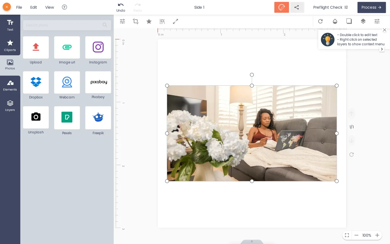 Customer uploading an image into the Cmsmart online designer canvas for a sticker