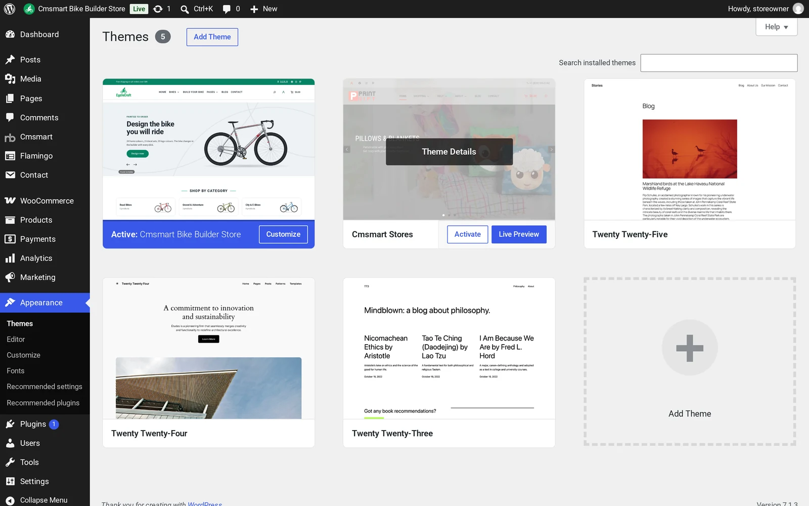 WordPress Appearance Themes screen with Cmsmart Bike Builder Store active and the Cmsmart Stores parent theme installed alongside it